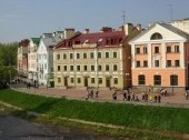 Nowadays embankment with houses in Pskov