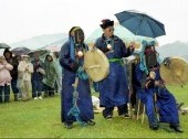 Tourists watching the shamanic rituals