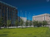 Parliament of Finland on the right, and new supplemental offices on the left