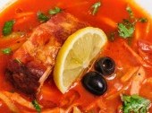 Solyanka - thick, spicy and sour soup that contains pickled cucumbers