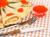 Blini (thin pancakes) with salmon roe