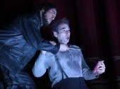 Dimitris Tiliakos as Rigoletto. Alexander Tsymbalyuk as Sparafucile.