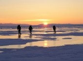 Walking at ice of Lake Baikal