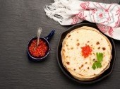 Blini (thin pancakes) with salmon roe