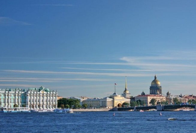 Saint-Petersburg. View of the Palace quay (Winter Palace - Hermitage, Admiralty, St. Isaac's Cathedral, Palace Bridge, Neva). Weather sunny.
