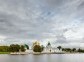 View to the Ipatievsky monastery from Volga river under heavy clouds, Kostroma, Russian Federation