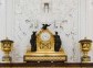 Antique clock in gold case in the interior of the Hermitage