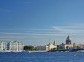 Saint-Petersburg. View of the Palace quay (Winter Palace - Hermitage, Admiralty, St. Isaac's Cathedral, Palace Bridge, Neva). Weather sunny.