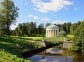 Summer landscape of the Pavlovsk garden, Russia. View from the pool to the temple of Friendship pavilion.